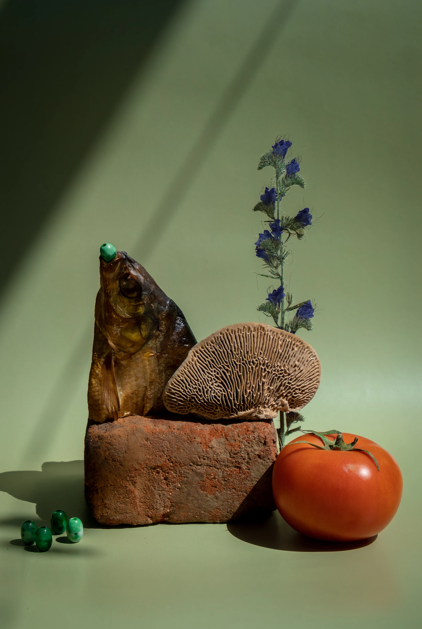 Seasonal vegetables, a linen market bag, and a handwritten kitchen list on a table
